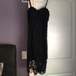 Black midi dress with lace detailing